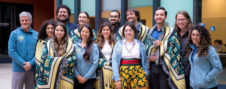 2 of 5, Groups of Native American students and faculty smiling together