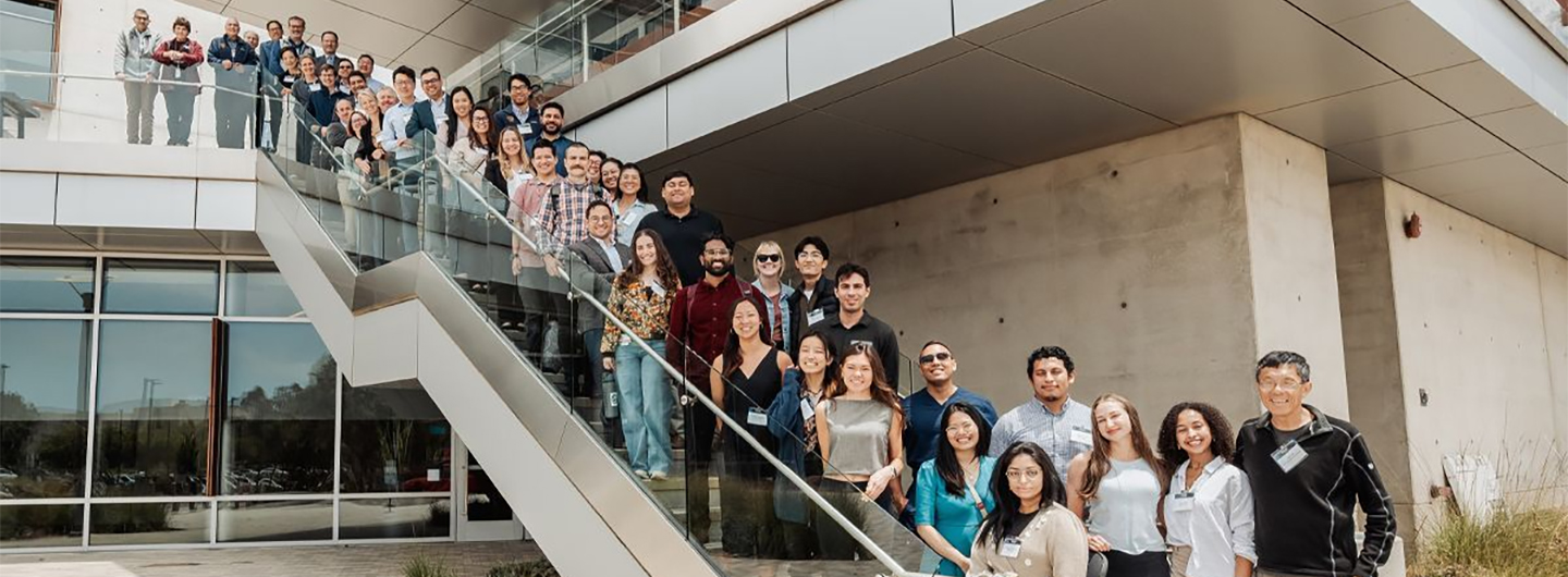 Group photo of people on outside staircase
