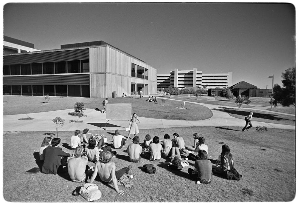 Students from the 1980s learning outside