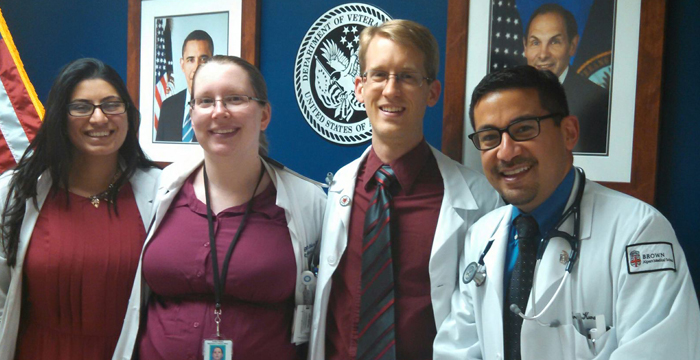 Brian Kwan posing with friends from medical school