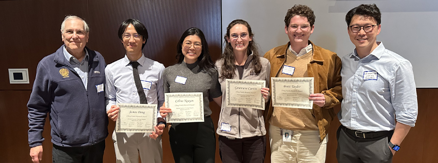 3 of 11, Faculty and students posed and smiling at camera. Four students are holding award certificates