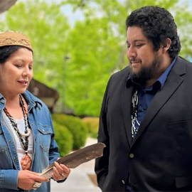 Tishmall Turner, M.B.A., Former Vice Chair, Rincon Band of Luiseño Indians (Left), talks with  Alec Calac, Ph.D., Pauma Band Luiseño Indians and UC San Diego Medical Student.