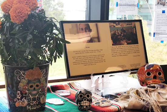 table display of cultural items for Dia le los Muertas celebration