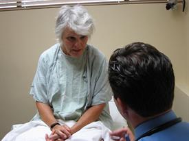 Doctor talking with standardized patient