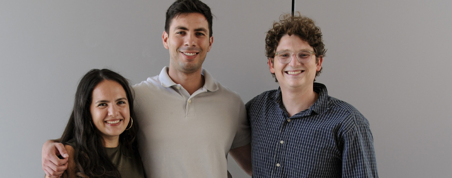 2 of 6, group of three people smiling at camera